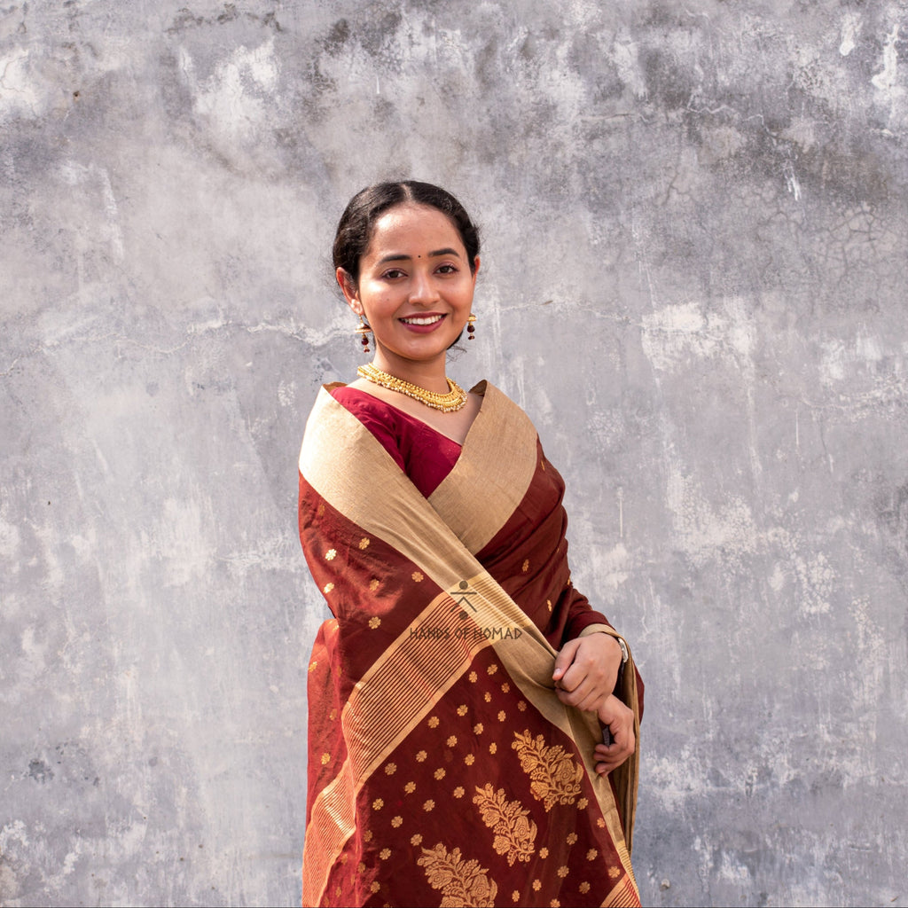 Woman wearing a Maroon Cotton Silk Chanderi Saree.
